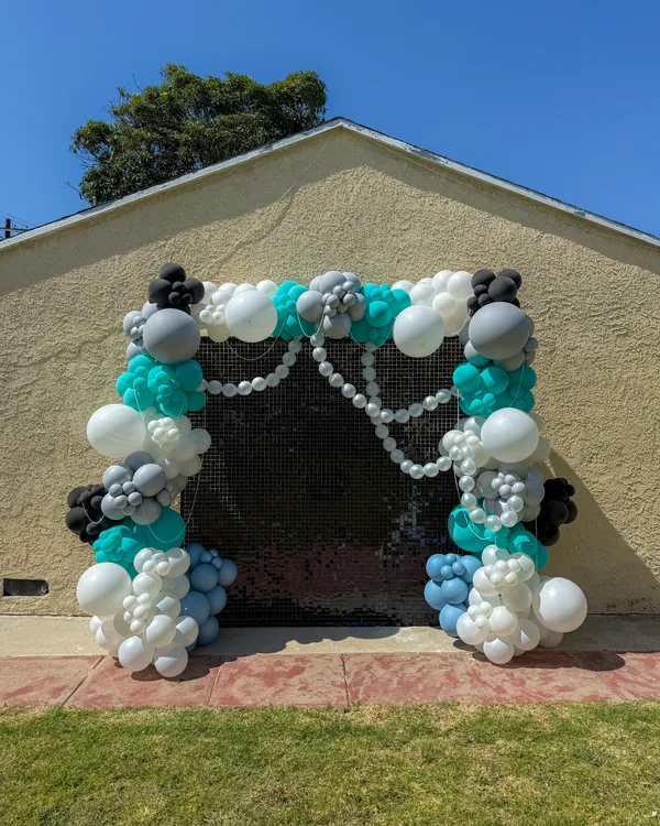Jocelyn's Sweet 16 — Black Shimmer in Baldwin Hills — Birthday backdrop and garland in Baldwin Hills