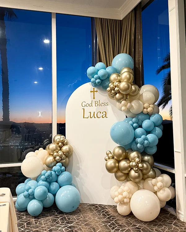 God Bless Luca — Baptism backdrop and garland in Burbank