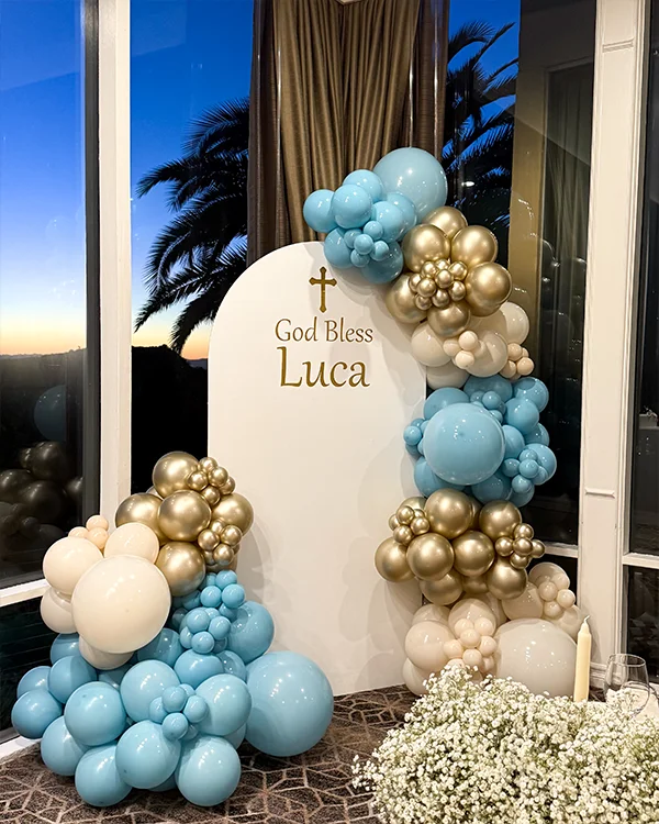 God Bless Luca baptism balloon decor at Castaway Restaurant Burbank