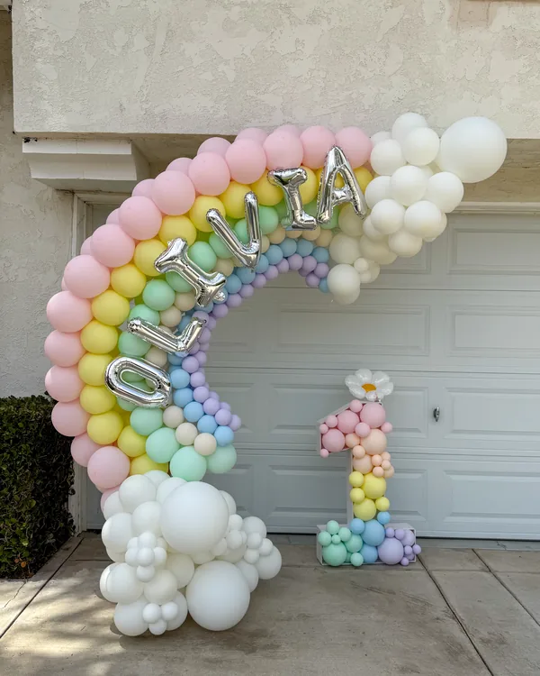 Olivia's pastel rainbow 1st birthday balloon decor Simi Valley