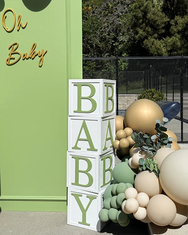 Sabrina's Baby Shower — Baby Shower backdrop and garland in Mandeville Canyon