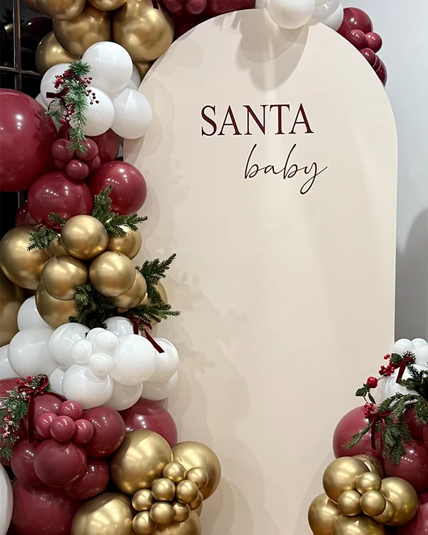 Santa Baby Shower — Baby Shower backdrop and garland in Glendale