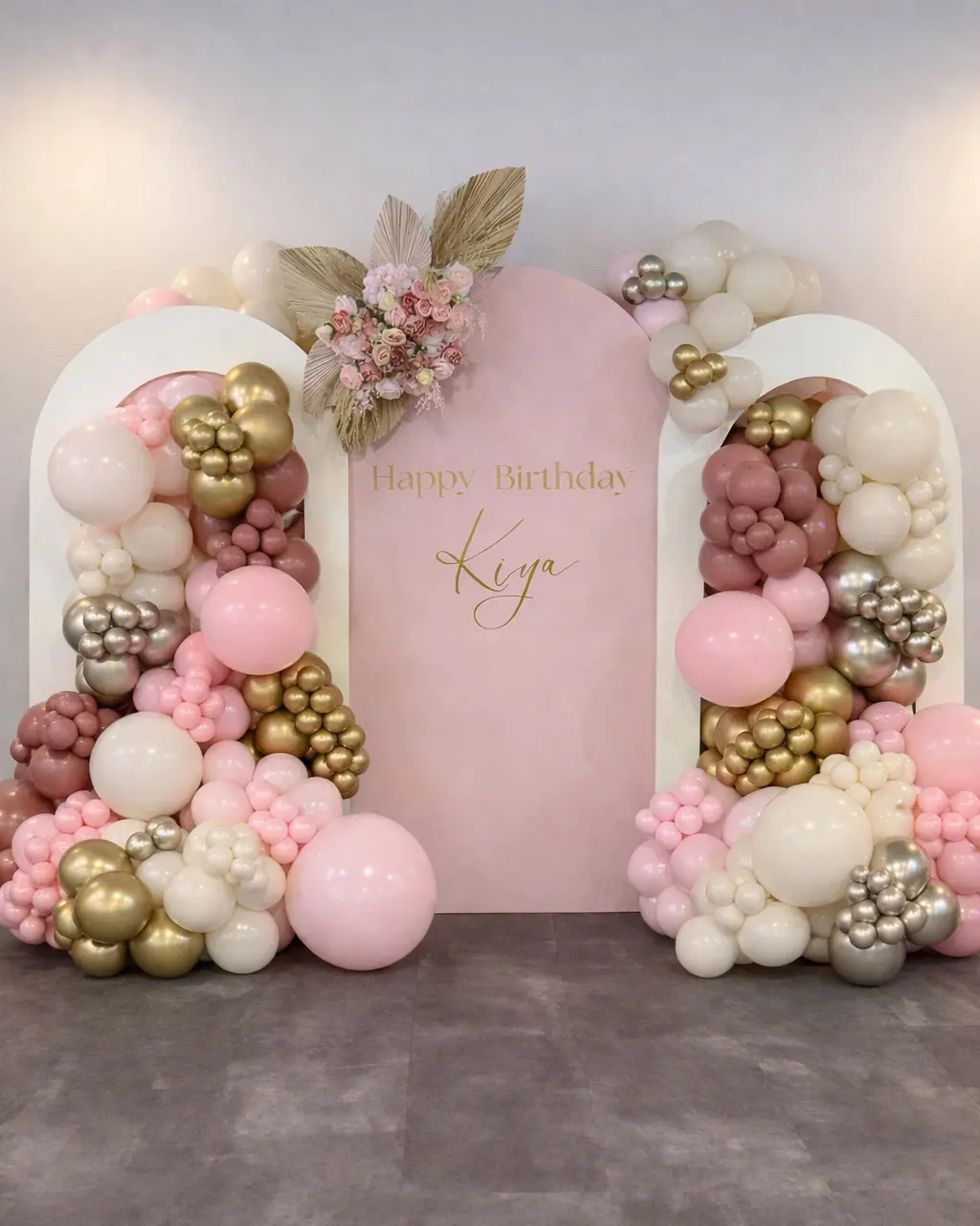 Organic balloon garland installation at a Los Angeles venue